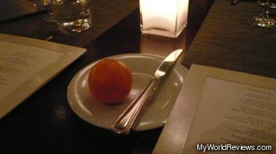 There was a clementine waiting at each place on the table