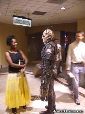 Borg conversing with visitors outside the star trek area