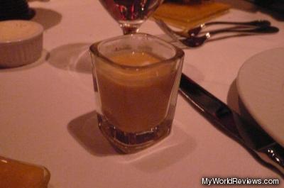 A small glass of soup