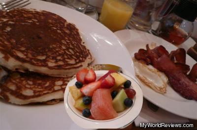 Walnut Banana Blueberry Pancakes with eggs and bacon (and tea, juice, fruit)