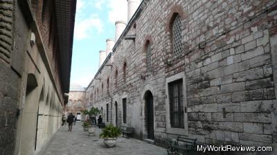 A street between two buildings in the palace