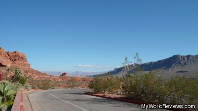 Note the contrast between the red rock in the Valley of Fire and the colorless rock outside