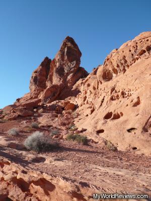 The late afternoon sun on the red rock